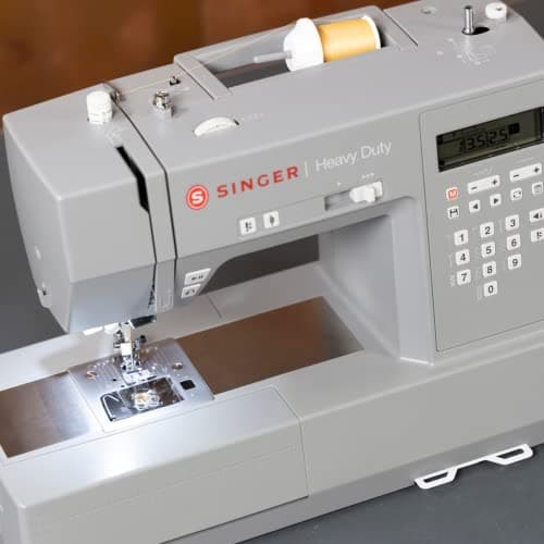 SINGER Heavy Duty 6700C Computerized Sewing Machine with Accessory Kit | Strong Motor with Enhanced Piercing Power, 411 Stitch Applications, LCD Screen, Full Metal frame & 1-step Buttonhole 11