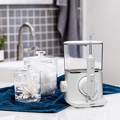 Waterpik Evolution Water Flosser, White - 90 Seconds of Flossing Time - 10 Pressure Settings, 360-Degree Swivel Handle - Includes Six Tips & Tip Storage Case 8