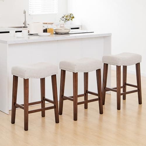 PrimeZone Counter Height Bar Stools Set of 3-24 Inch Backless Saddle Barstools with 4.3" Thick Upholstered, Nailhead Trim Linen Fabric & Solid Wood Legs, Counter Stools for Kitchen Island, Beige