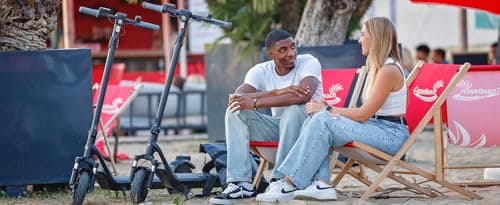 NIU Electric Scooter for Adults - Front Suspension, 600W Max Power, 18 Miles Range, Max Speed 17.4MPH, 9.5'' Pneumatic Tires, Dual Brakes, Easy Folding Portable Commuting Escooter, UL Certified 7