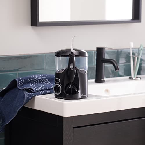 Waterpik Ultra Water Flosser, Black - 90+ Seconds of Flossing Time - 10 Pressure Settings, 360-Degree Tip Rotation - Includes Six Tips & Built-in Tip Storage 5