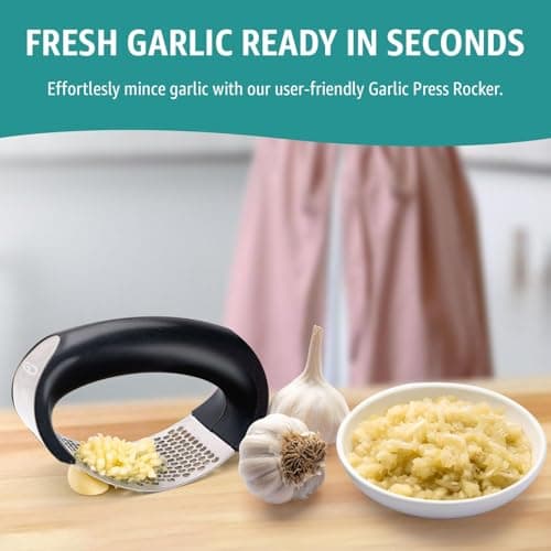 Garlic press rocker, crusher, mincer tool stainless steel with a Garlic Peeler, spatula, and Brush extract more Garlic Paste. The Garlic Mincer Tool Squeezes, Extracts, Crushes 7