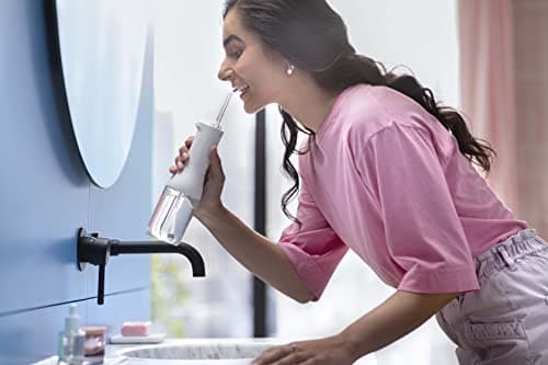 Philips Sonicare Water Flosser Cordless – Rechargeable Power Dental Waterflosser for Teeth, Portable Oral Irrigator with 3 Intensity Settings, 360° Rotating Nozzle – (Mint) 8