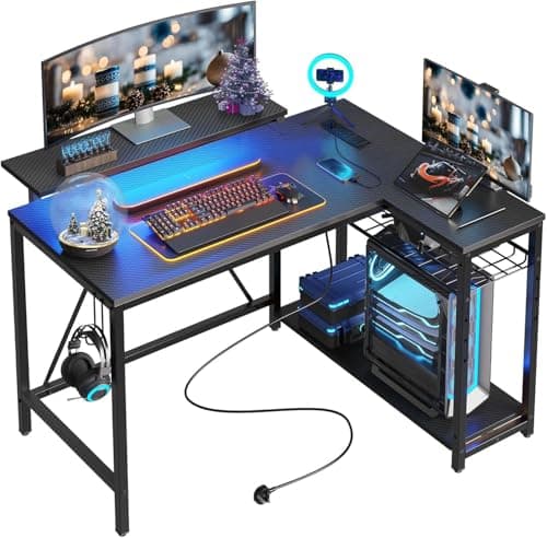 Bestier Gaming Desk with Power Outlets, 42" L-Shaped Computer Desk with LED Lights, Desk with Reversible Storage Shelves & Hooks for Small Spaces, Bedrooms & Offices, Black Carbon Fiber