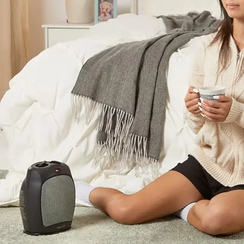 Amazon Basics Oscillating Ceramic Space Heater, Portable Fast Heating Indoor Solution, With Overheat and Tip-Over Protection, Thermostat, 1500W, 7.52"D x 6.34"W x 9.45"H, Black 7