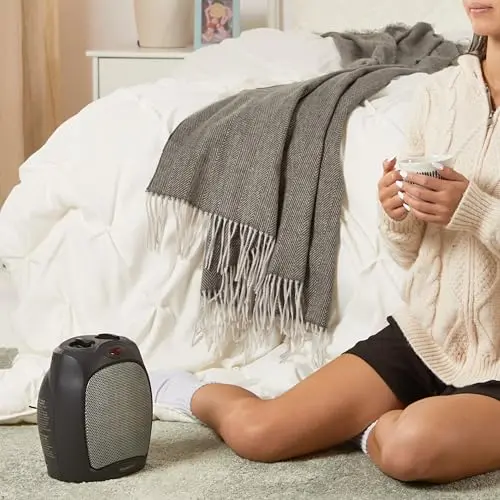 Amazon Basics Ceramic Space Heater, Portable Indoor Heating Solution, With Overheat and Tip-Over Protection, Thermostat, Non-Oscillating, 1500W, 7.52"D x 6.34"W x 9.45"H, Black 7