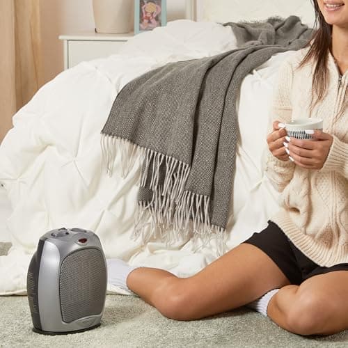 Amazon Basics Oscillating Ceramic Portable Indoor Space Heater, Fast Heating Technology, Overheat and Tip-Over Protection, Adjustable Thermostat, 1500W, 7.52"D x 6.34"W x 9.45"H, Silver 7